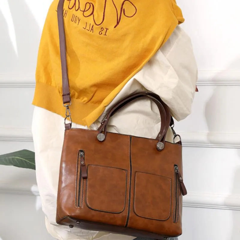 Stylish Leather Tote Bag Featuring Functional Front Pockets | ribuella