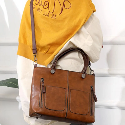 Stylish Leather Tote Bag Featuring Functional Front Pockets | ribuella