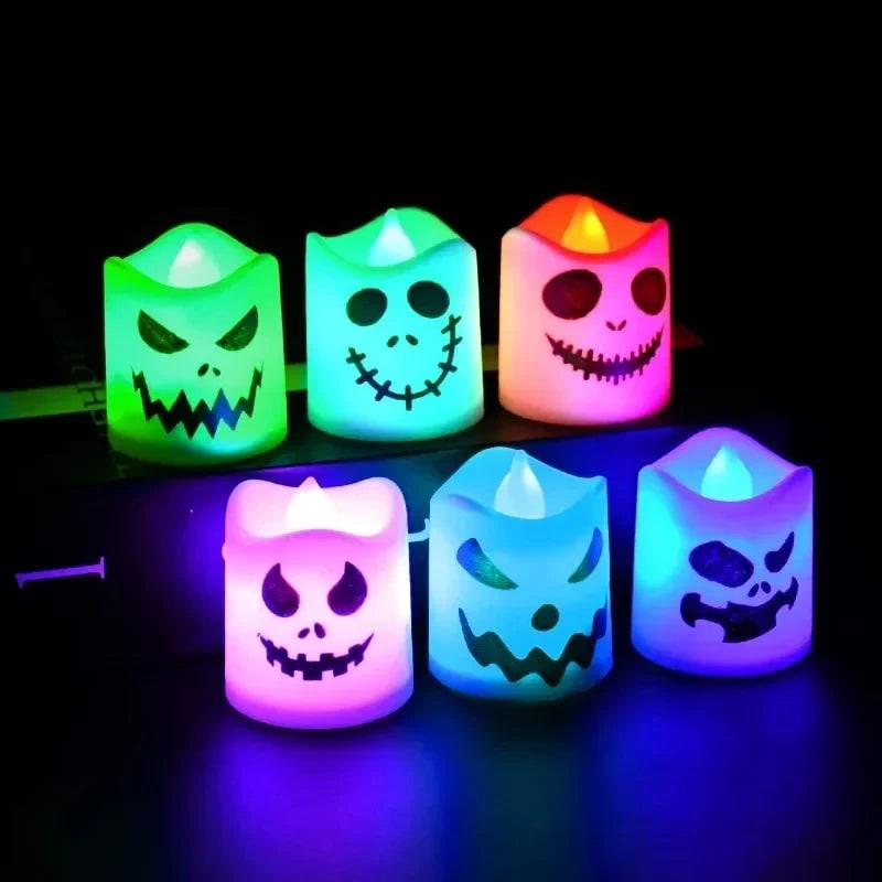 Six Pack Battery Operated LED Tea Lights — Shifting Color Palette And Spooky Face Designs