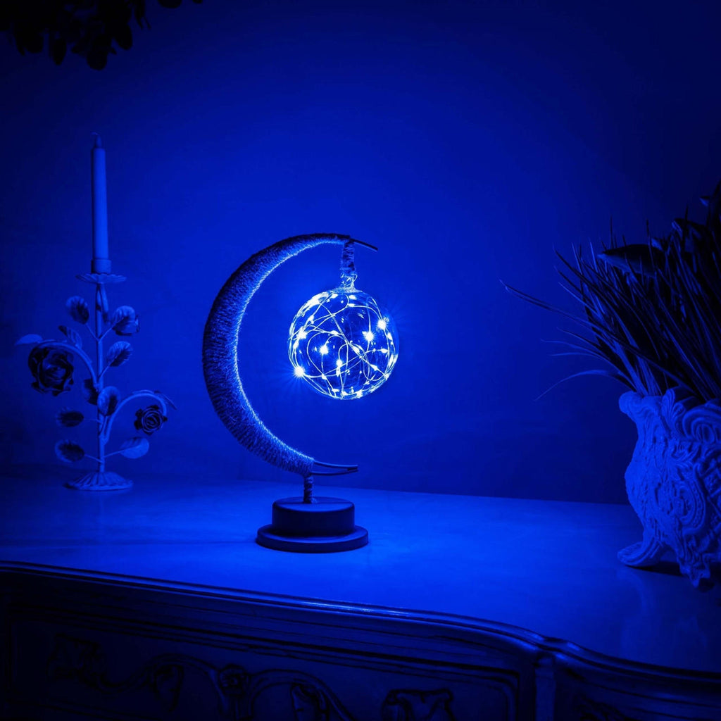 Dekorativ bordlampe med stemningsfuldt måneskær og blødt, lysende design