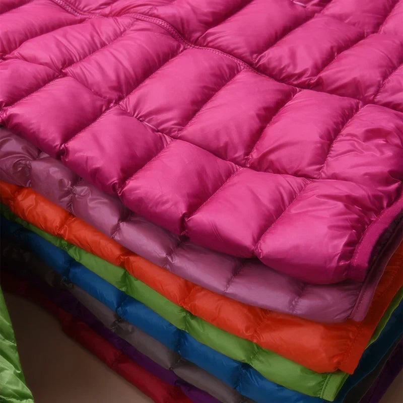 Chaqueta de plumas ligera con capucha para mujer — cálida y fácil de guardar