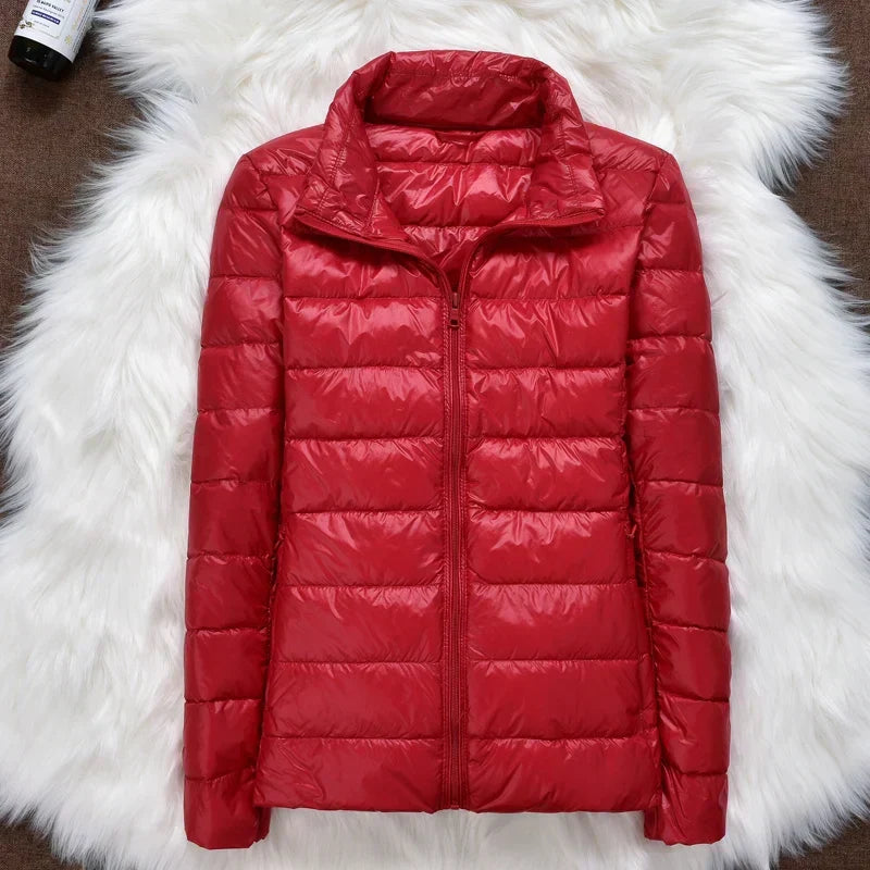 Chaqueta de plumas ligera con capucha para mujer — cálida y fácil de guardar